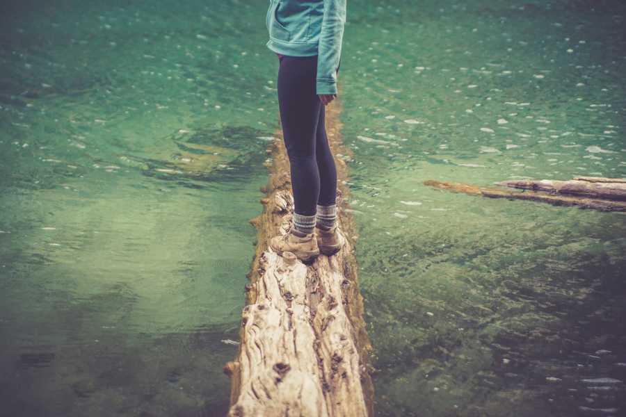 Standing on a log