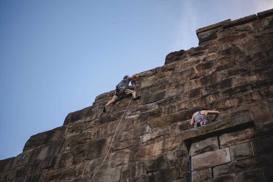 Climbers ascend the Manchester Wall